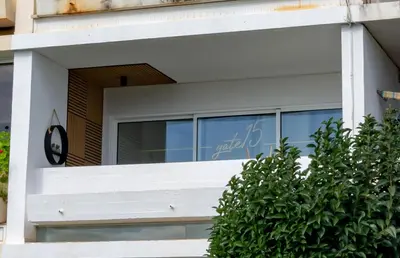 a window on the side of a building at gate15 in Machico