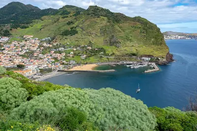 a view of a small island in the water at gate15 in Machico
