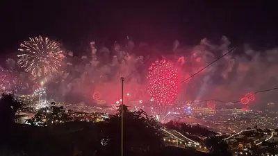 a firework display in a city at night at Casa D'Avó Filó in Funchal
