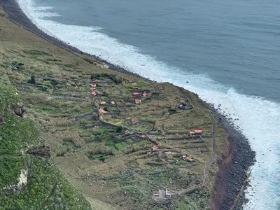 an aerial view of an island next to the ocean at Achadas da Cruz Farm House in Achadas da Cruz