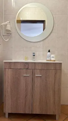a bathroom with a sink and a mirror at Eco Natura Falcoeira - Praia da Luz in Montinhos da Luz