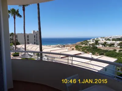 a balcony with a view of the ocean at Bel appartement 2 pieces, bord de mer et vue mer in Lagos