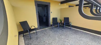 a waiting room with two chairs and a mirror at Quinta Das Rosas 5 in Estreito da Calheta