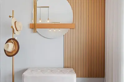 a room with a white stool and a mirror at Glimpse of the City by Homie in Funchal