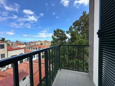 a balcony with a view of the city at Center Funchal - Rooms For Rent in Funchal
