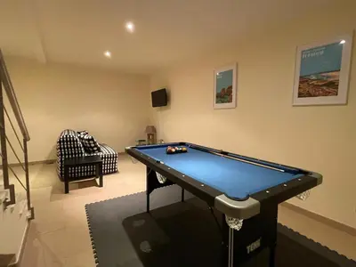a living room with a pool table in it at No14 Lote B, Quinta da Belavista in Luz