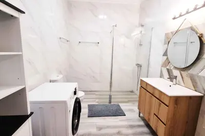 a bathroom with a shower and a toilet and a sink at Sun & Fun in Sagres in Sagres