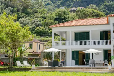 a villa with a view of the house at São Vicente Guest House in São Vicente