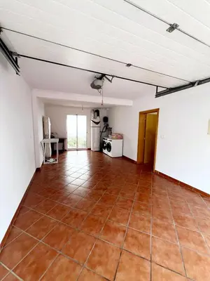 an empty room with a tile floor and white walls at Villa Abreu in Ponta do Sol