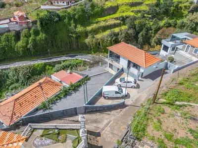 an overhead view of a gas station with a car parked at Calheta Sunsets in Estreito da Calheta