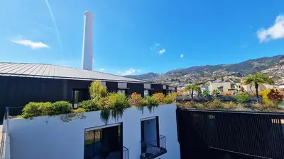 a building with plants on the top of it at Daysy Loft by LovelyStay in Funchal