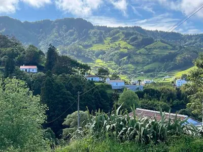 a town on a hill with trees and houses at Sun Island Retreat - Great Sunny Island Sea view in Vila do Porto