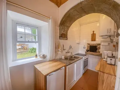 a kitchen with a sink and a window at Sun Island Retreat - Great Sunny Island Sea view in Vila do Porto