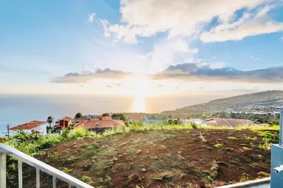 a view of the ocean from the balcony of a house at Vila Cales e Chadas by Your Madeira Rentals in Arco da Calheta