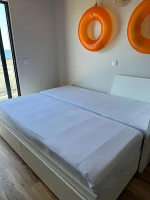 a bathroom with orange tiles and a toilet and a sink at Caniçal houses - Madeira in Caniçal
