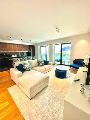 a living room with two couches and a table at LUX OCEAN VIEW Apartment Varino 05 in Funchal