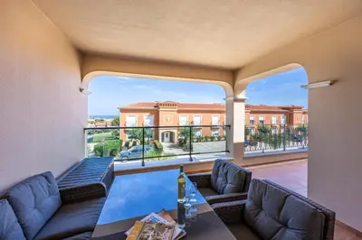 a large living room with a view of a building at Boa Vista - Casa Jacques in Lagos