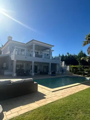 a large white house with a swimming pool at 3 Bedroom villa with a sea view completely private in Alagoas