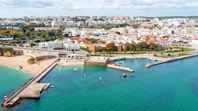 an aerial view of a city and a body of water at Boa Vista - Golf View Villa in Lagos