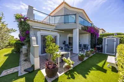 an image of a house with a garden at Boa Vista - Golf View Villa in Lagos