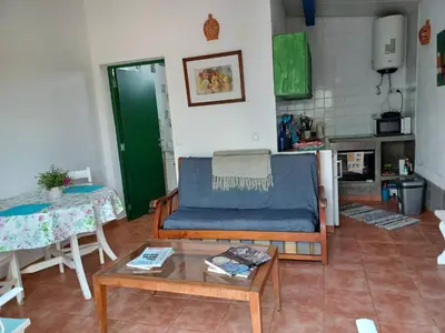 a living room with a couch and a table at Casa da Oliveira - Nice 2 bedrooms Bungalow in Lagos in Lagos