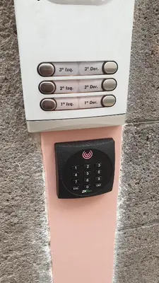 a remote control sitting on top of a pink object at RC Fltas Funchal B in Funchal