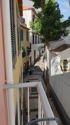 a view of a street from the balcony of a building at RC Fltas Funchal C in Funchal