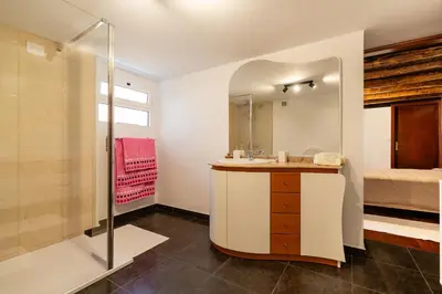 a bathroom with a shower and a sink at Casa Silva, Calheta in Calheta