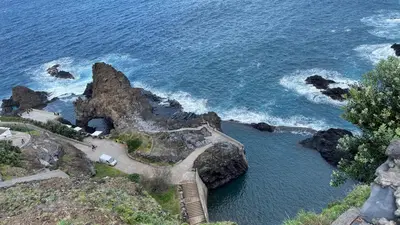 an aerial view of a rocky island in the ocean at Casas das Hortas, Apartamento Vista Mar in Seixal