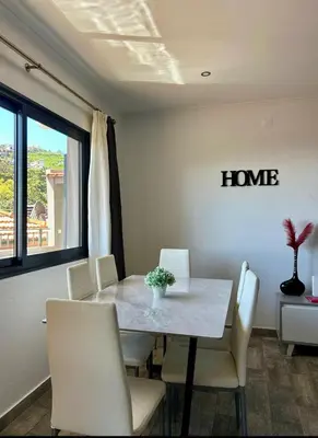 a balcony with a view of a city at Casa Rodrigues in Funchal