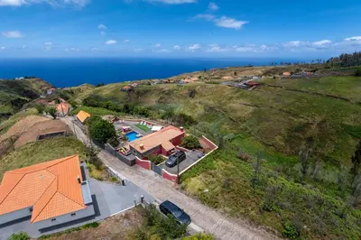 an overhead view of a house with an orange roof at Villa Roque by An Island Apart in Calheta
