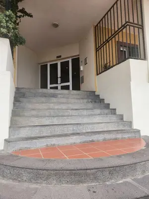 a set of stairs in front of a building at Blue Diamond-seaview & free park in Funchal