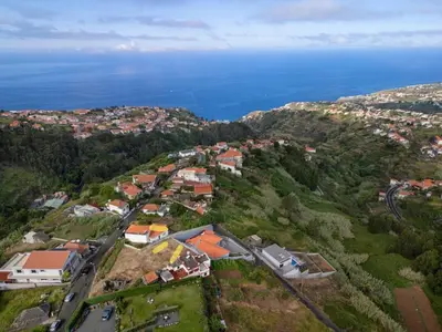 an aerial view of a town and the ocean at Calheta Paradise Holiday Home - Free Parking & Views in Arco da Calheta