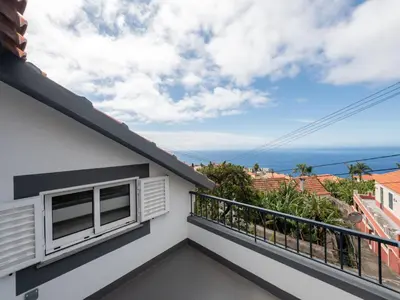 a balcony with a view of the ocean at Akivillas Calheta Aura in Arco da Calheta