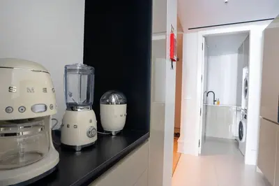 a kitchen with a blender on a counter at Empire Luxury Suite - Savoy Insular in Funchal