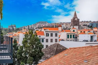 a view of a city with orange roofs at Empire Luxury Suite - Savoy Insular in Funchal