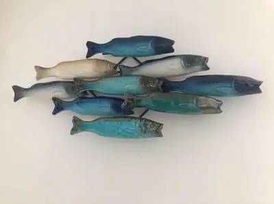 a group of fish sitting next to each other at Casa Dolce Farniente in Luz