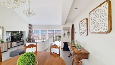 a dining room with a table and chairs at Casa Clementine by LovelyStay in Funchal