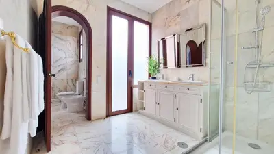a bathroom with a shower and a toilet and a sink at Casa Clementine by LovelyStay in Funchal