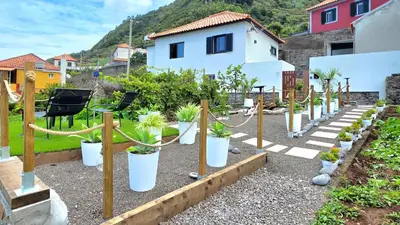 a garden with a bunch of potted plants at The North Paradise - Porto Moniz in Porto Moniz