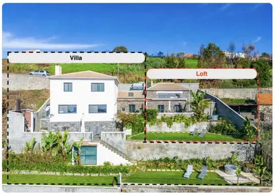 a picture of a house with a sign that reads wifi at Meerblick - Exklusives Loft mit Terrassen & Hot-Tub in Fajã da Ovelha