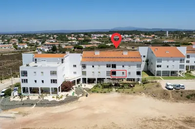 an aerial view of a house with a red balloon at Bela Vista_Cozy Apt With Sea View in Praia da Arrifana