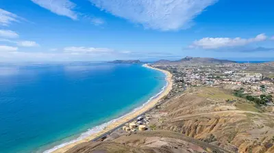 an aerial view of a beach and the ocean at Abelisa by An Island Apart in Porto Santo
