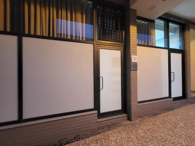 a row of doors in a building at Lovers Caniço Center in Caniço