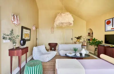 a living room with a couch and a table at Pirate House Sea front Private Pool Garden Funchal in Funchal
