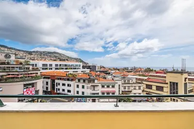 a view of a city from a balcony at SUPER Top Floor in Funchal
