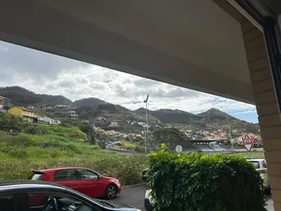 a view of a city from a parking lot at Xanda Escape in Machico