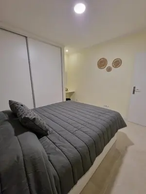 a bedroom with a large bed in a room at Atlantic Garden Santa Luzia 44 in Funchal