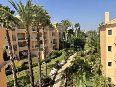an aerial view of the courtyard of a hotel with palm trees at Seaview apartment Estrela da Luz Praia da Luz in Luz
