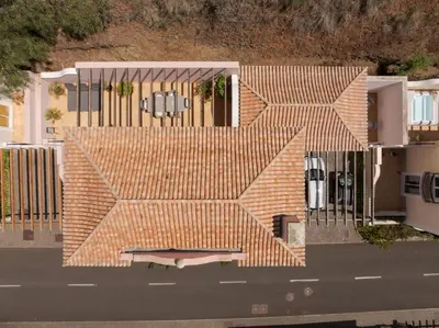 an aerial view of a house with an orange roof at Villa Eve Palheiro Village by Holiday Rental Madeira in Funchal